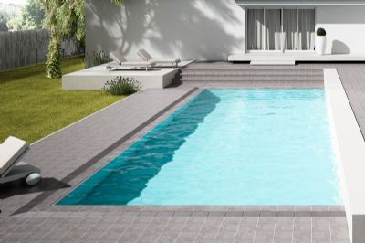 Piscina desbordante Fuji. Borde Técnico. Rejilla cerámica.