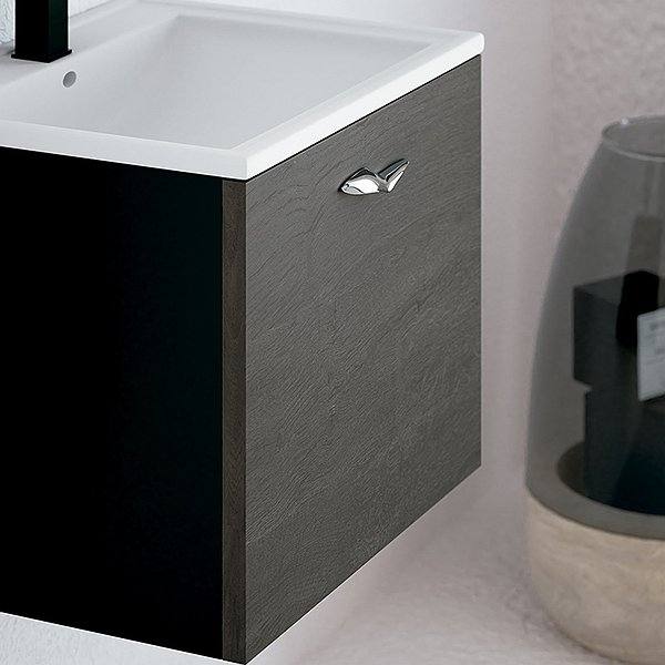 Detalle del tirador y lavabo