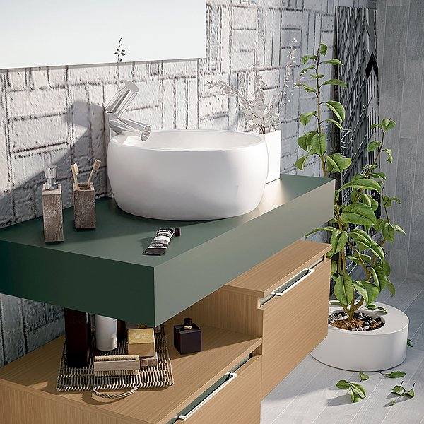 Encimera con faldón verde pizarra mate con lavabo sobre encimera circular