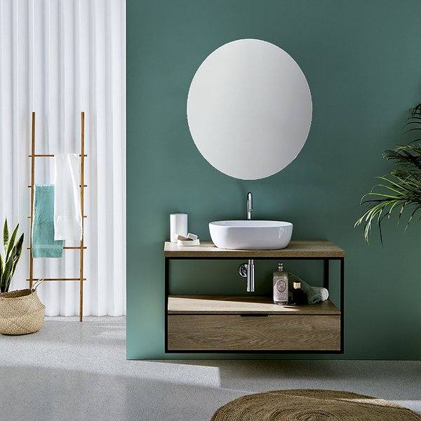 Mueble de baño con lavabo line sobre encimera + tapa de madera + Espejo redondo. Acabado del mueble en Nórdico